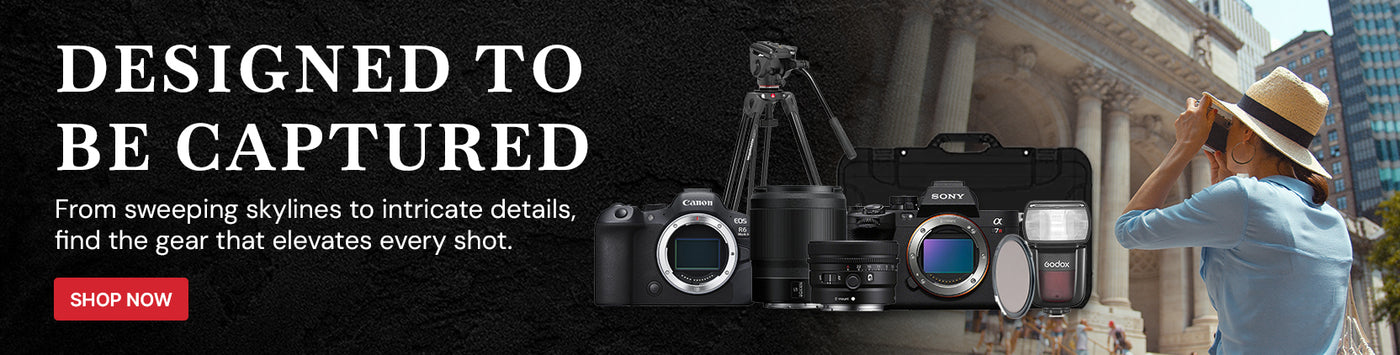 Camera equipment with a person taking a photo, set against a cityscape background.